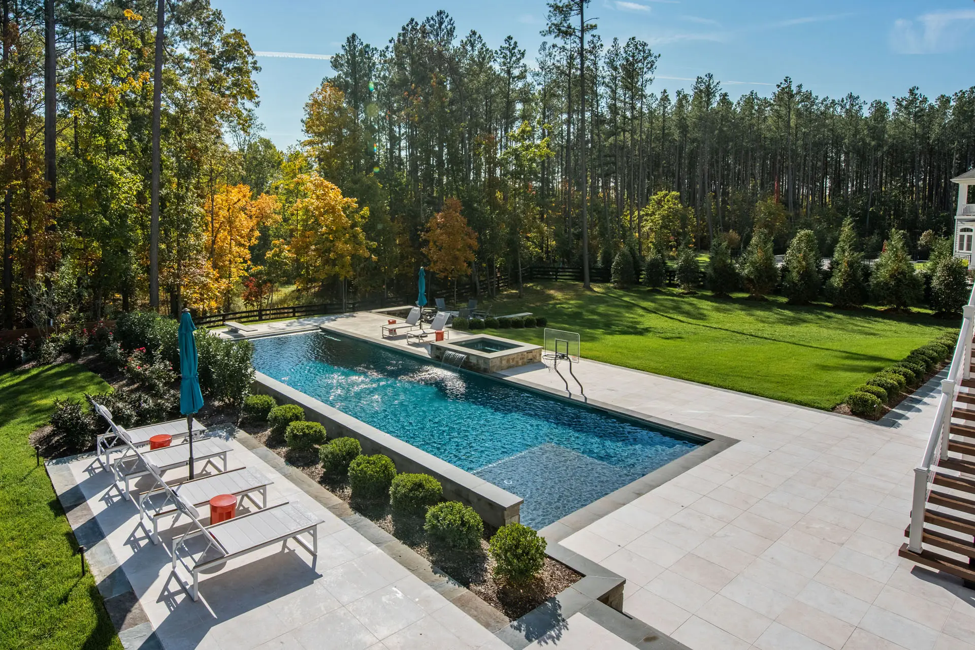 view of pool from sunroom